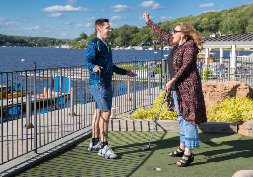 People Playing Mini Golf